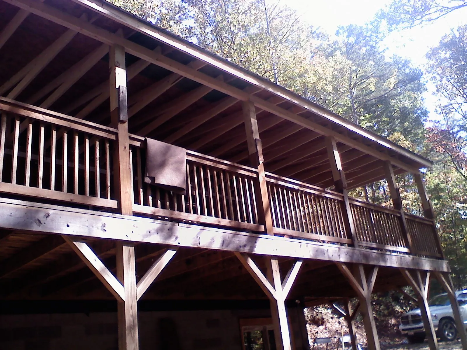 Timber framing under a new elevated porch and deck — Roof Leak Repair in Newberg by Roofing Brothers
